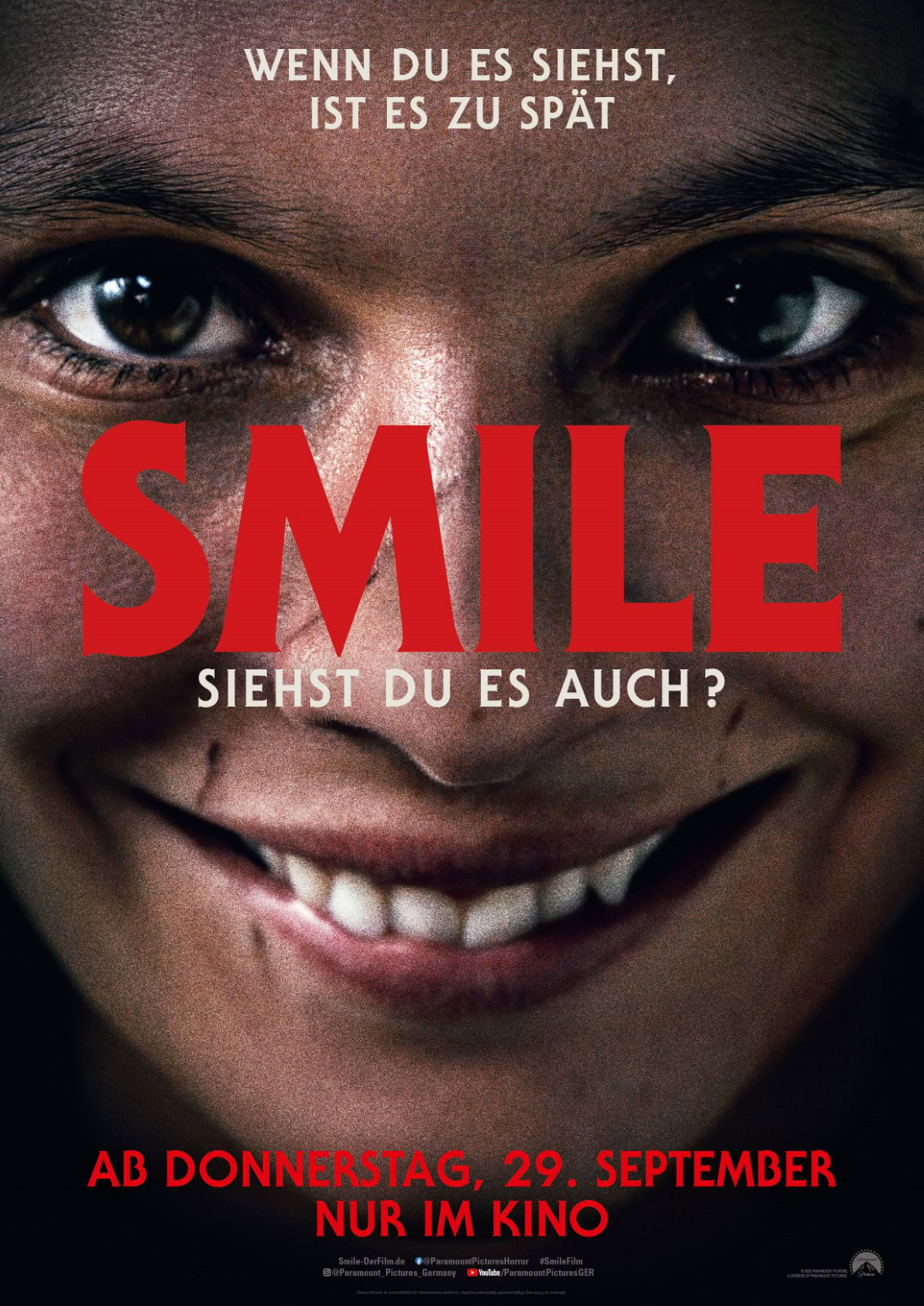Smile Filmplakat mit bedrohlichem Lächeln