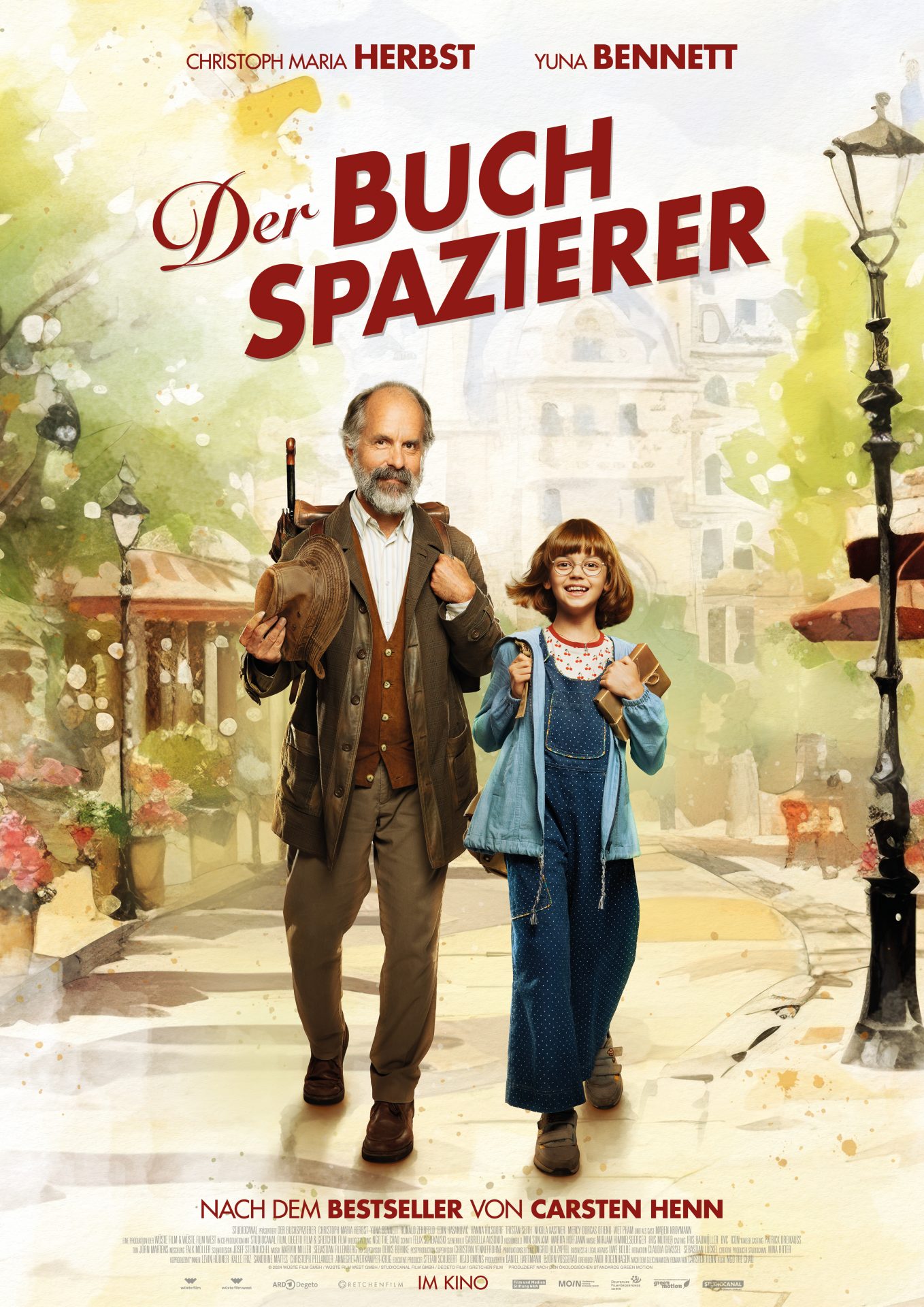 Filmplakat: Der Buchspazierer, zwei Personen auf Straße